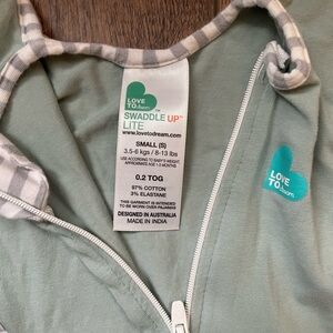 Love to dream hands up swaddle